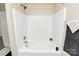 Minimalist tub and shower, offering a clean and modern design for a relaxing bathing experience at 2045 Flushing Ct, Charlotte, NC 28215