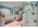 Beautiful bathroom with a separate shower, soaking tub, and plenty of vanity space at 21216 Norman Shores Dr, Cornelius, NC 28031