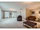 Spacious carpeted bonus room with comfortable seating, neutral walls, and bright natural light at 2322 Tessa Trce, Clover, SC 29710