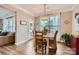 The dining area features hardwood floors, natural light, and backyard access at 2322 Tessa Trce, Clover, SC 29710