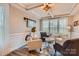 Cozy living room with decorative ceilings, large window for natural lighting and neutral wall paint at 2322 Tessa Trce, Clover, SC 29710