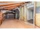 Spacious unfinished attic showing exposed beams, insulation, and potential for customization at 239 N Faulkner Way, Davidson, NC 28036