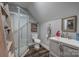 Bathroom with a shower, toilet, and vanity, offering a practical and functional space at 2676 Will Schronce Rd, Iron Station, NC 28080