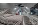 Upper level bedroom with wood floors and ceiling fans, designed for relaxation and comfort at 2676 Will Schronce Rd, Iron Station, NC 28080