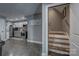 Basement kitchenette and staircase, providing a convenient setup for cooking and access to other levels at 2676 Will Schronce Rd, Iron Station, NC 28080