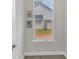 Cozy dog room featuring a view of the backyard and portraits of pampered pets at 2902 Oakdale Rd, Charlotte, NC 28216