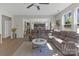 Cozy living area with views of the open-concept kitchen, comfortable seating, and neutral decor at 2902 Oakdale Rd, Charlotte, NC 28216