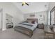 Comfortable main bedroom with neutral colors and a bench at the foot of the bed at 2902 Oakdale Rd, Charlotte, NC 28216