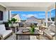 Covered patio offers a relaxing outdoor space with comfortable seating and views of the neighborhood at 330 Armour St # 46, Davidson, NC 28036