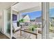 Relax on the covered outdoor patio with comfortable seating and stylish decor, perfect for enjoying the fresh air at 330 Armour St # 46, Davidson, NC 28036