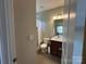 This bathroom offers a shower and vanity with tile floors and neutral paint at 348 Ox Bow Cir, Mount Holly, NC 28120