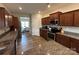 Spacious kitchen features granite countertops, stainless steel appliances, and ample cabinet space at 348 Ox Bow Cir, Mount Holly, NC 28120