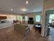 Bright and airy living room featuring neutral colors, plush seating, and an open floor plan at 348 Ox Bow Cir, Mount Holly, NC 28120