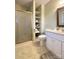 Bathroom featuring a shower, shelves, and vanity at 3660 9Th Street Ne Dr, Hickory, NC 28601
