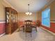Traditional dining room featuring a round table, wood chairs, and a china cabinet at 3660 9Th Street Ne Dr, Hickory, NC 28601
