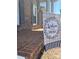 Inviting front porch with a 'Welcome to our Home' decorative flag at 3660 9Th Street Ne Dr, Hickory, NC 28601