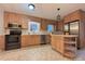 Well-lit kitchen featuring stainless appliances and a functional center island at 3660 9Th Street Ne Dr, Hickory, NC 28601