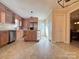 Bright kitchen featuring an island, stainless appliances, and wood cabinetry at 3660 9Th Street Ne Dr, Hickory, NC 28601