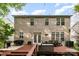 Enjoy outdoor living on the deck, perfect for entertaining in the backyard at 3915 Planters Watch Dr, Charlotte, NC 28278
