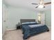 Comfortable bedroom featuring neutral walls and a ceiling fan for added climate control at 3915 Planters Watch Dr, Charlotte, NC 28278