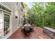 Spacious deck offers an outdoor dining area with beautiful wooded views, perfect for entertaining at 3915 Planters Watch Dr, Charlotte, NC 28278