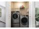 Convenient laundry room with modern washer and dryer at 3915 Planters Watch Dr, Charlotte, NC 28278