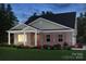 Charming single-story home with brick facade, covered porch, and manicured landscaping at 407 Bent Burr Crk, York, SC 29745