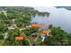 Aerial view showcasing lakefront property with house outlines and acreage boundaries. Beautiful location at 4516 Kiser Island Rd # 1, Terrell, NC 28682