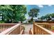 Backyard view toward lake with dock and water access from upper deck at 4516 Kiser Island Rd # 1, Terrell, NC 28682