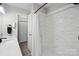 Bright bathroom showcasing a shower with white and gray marble pattern and a modern vanity at 4516 Kiser Island Rd # 1, Terrell, NC 28682