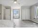 Bright and airy bedroom with wood floors, ceiling fan and nice windows overlooking the water at 4516 Kiser Island Rd # 1, Terrell, NC 28682
