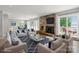 Bright, spacious living room featuring a stone fireplace and comfortable seating at 4516 Kiser Island Rd # 1, Terrell, NC 28682
