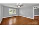 Bedroom featuring hardwood floors and natural light from the window at 5785 Nc 150 E Hwy, Denver, NC 28037