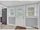 Sunlit entryway features a tiled floor, door to the outside, and transom windows at 5785 Nc 150 E Hwy, Denver, NC 28037