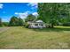 Charming home with large yard and tree, set back from road at 5785 Nc 150 E Hwy, Denver, NC 28037