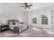 Charming bedroom with a ceiling fan and a view of the outdoors at 5820 Pittmon Ln, Kannapolis, NC 28081