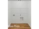 Neat, unfinished laundry room with wood look floors at 5820 Pittmon Ln, Kannapolis, NC 28081