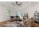 Bright and airy living room featuring hardwood floors and ample natural light at 5820 Pittmon Ln, Kannapolis, NC 28081