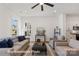 Bright and airy living room featuring hardwood floors and ample natural light at 5820 Pittmon Ln, Kannapolis, NC 28081