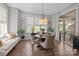 Cozy dining area with natural light, a round table, and elegant decor, perfect for entertaining at 6008 Candlestick Ln, Lancaster, SC 29720