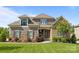 Well-manicured lawn and landscaping compliment the front elevation of this house at 6008 Candlestick Ln, Lancaster, SC 29720