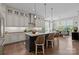 Bright open kitchen with an island, bar seating, and seamless flow to the dining area at 6008 Candlestick Ln, Lancaster, SC 29720