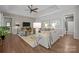 Elegant living room with a comfortable sofa, tray ceiling and stylish decor, ideal for relaxation at 6008 Candlestick Ln, Lancaster, SC 29720