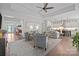 Open-concept living room with seamless flow to the kitchen and dining area, ideal for modern living at 6008 Candlestick Ln, Lancaster, SC 29720