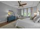 Inviting main bedroom offering ample natural light, a ceiling fan, and comfortable seating area at 6008 Candlestick Ln, Lancaster, SC 29720