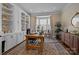 Well-lit home office with custom built-ins, a bay window, and a spacious work area at 6008 Candlestick Ln, Lancaster, SC 29720