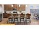 Well-designed kitchen featuring bar stool seating, a kitchen island, and modern finishes at 6443 Honor Ave, Midland, NC 28107