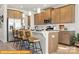 Bright kitchen with light-colored cabinets, a modern island, and an open layout at 6443 Honor Ave, Midland, NC 28107
