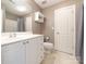 Well-lit bathroom with a white vanity, toilet, and shower/tub combination at 7040 Edenderry Dr, Charlotte, NC 28270