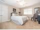 Cozy bedroom featuring a comfortable bed, soft lighting, and a calming atmosphere at 7040 Edenderry Dr, Charlotte, NC 28270